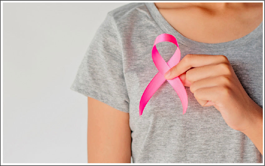 Woman wearing the Breast Cancer Pink Ribbon for Breast Cancer Awareness