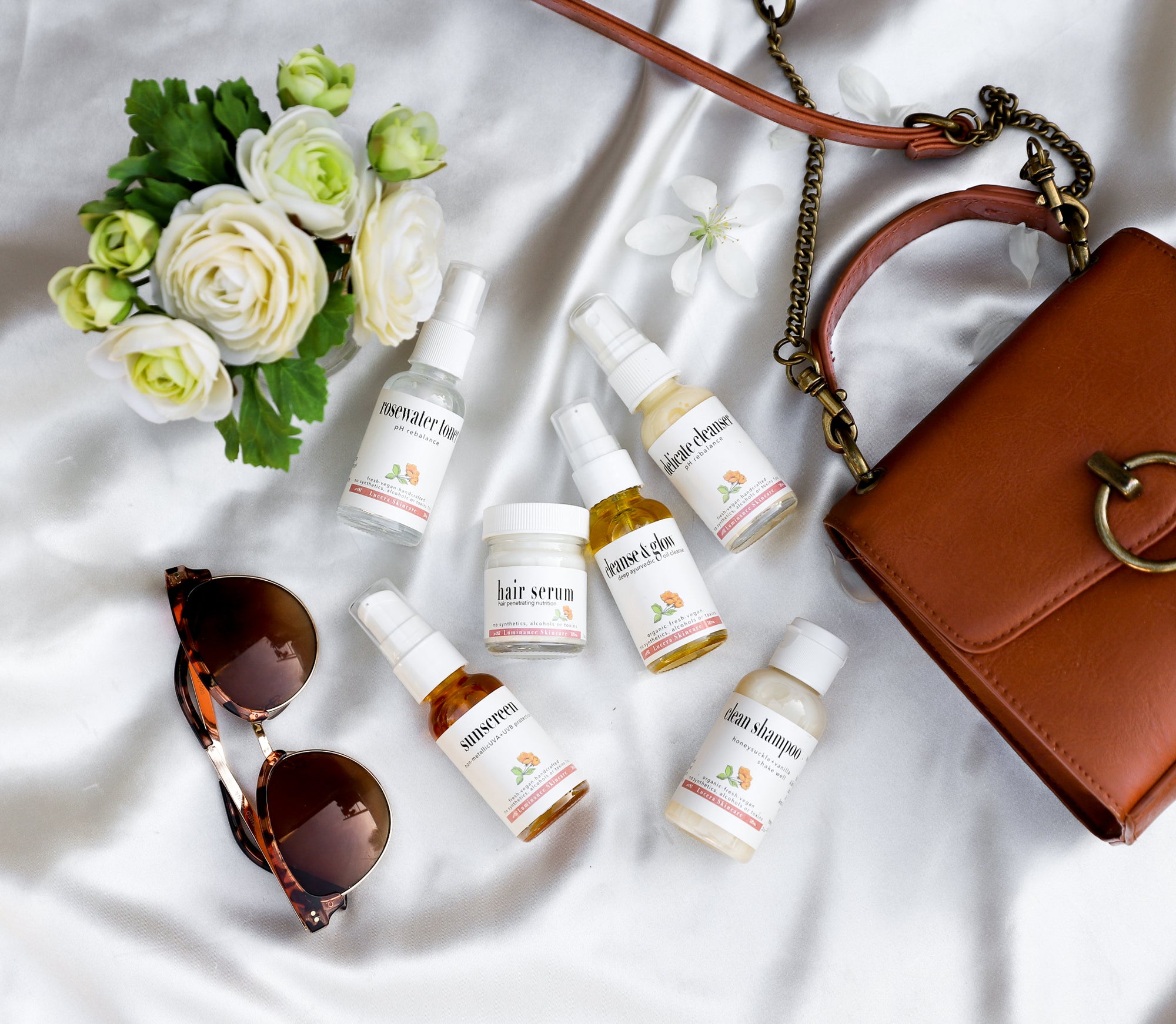 Travel with your skincare image with travel bag and skincare products